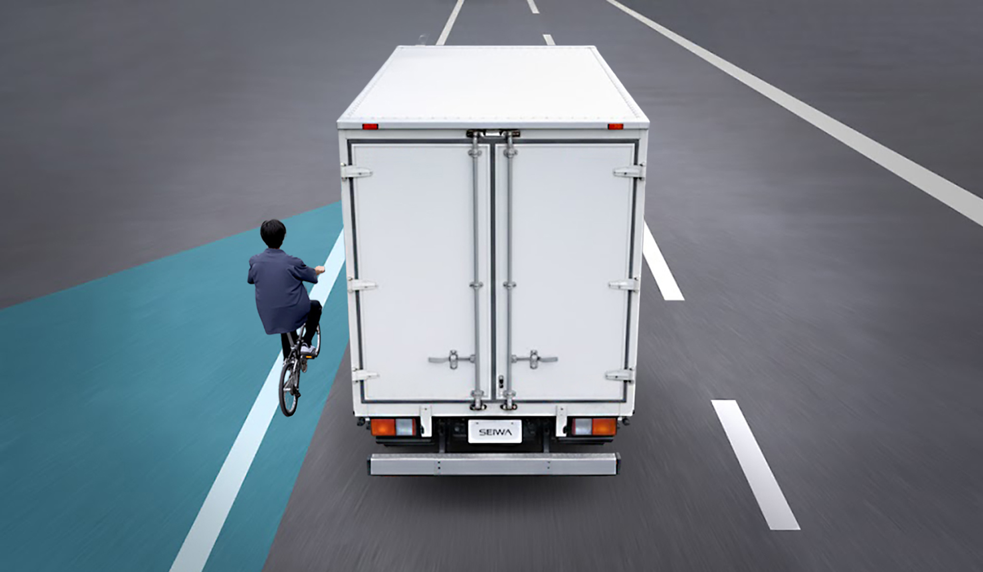 ハイエースと自転車が並走している写真